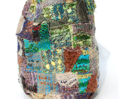"Humble Ruthenium" by Deborah Kuster (c) - 11"h x 9"w x 9"d - handwoven textiles, styrofoam, embroidery thread